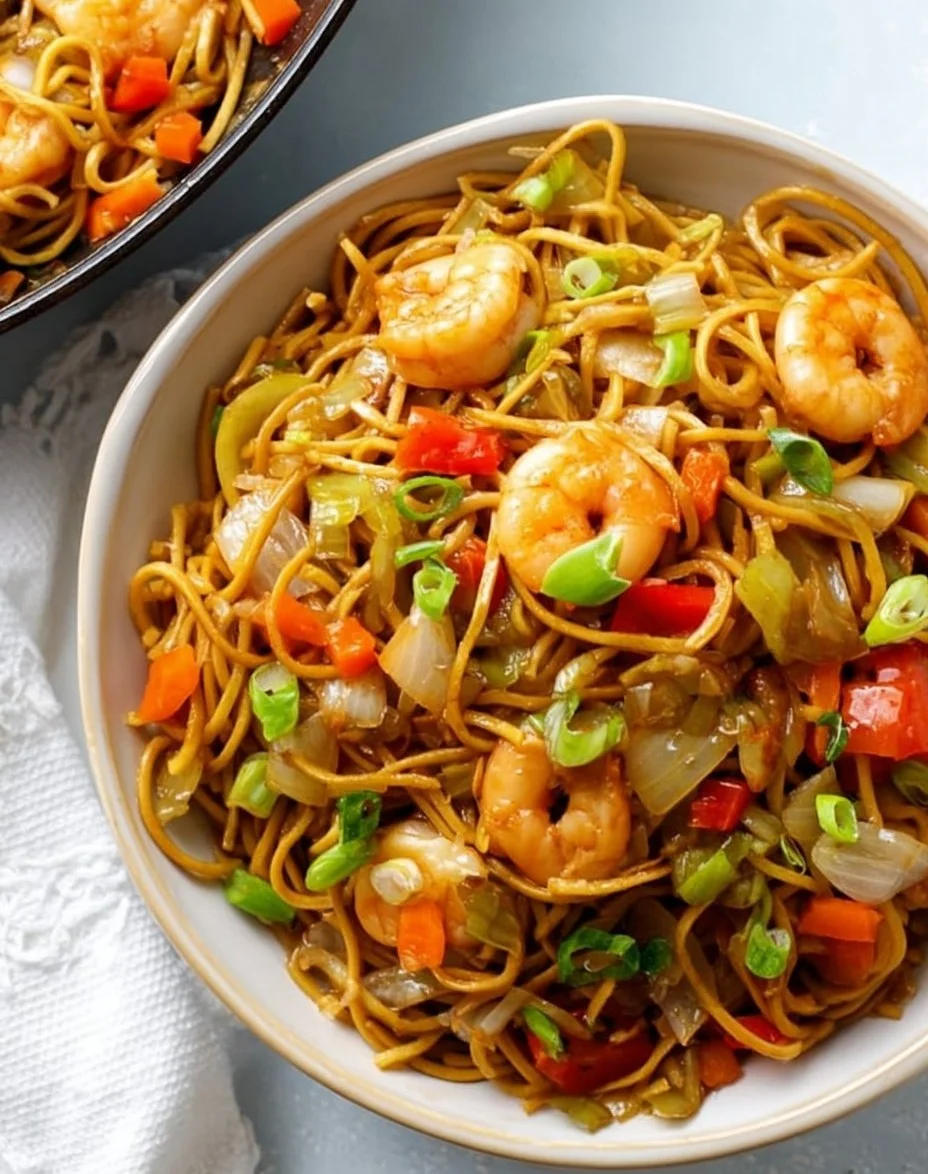 Plate of easy shrimp lo mein with vegetables and noodles