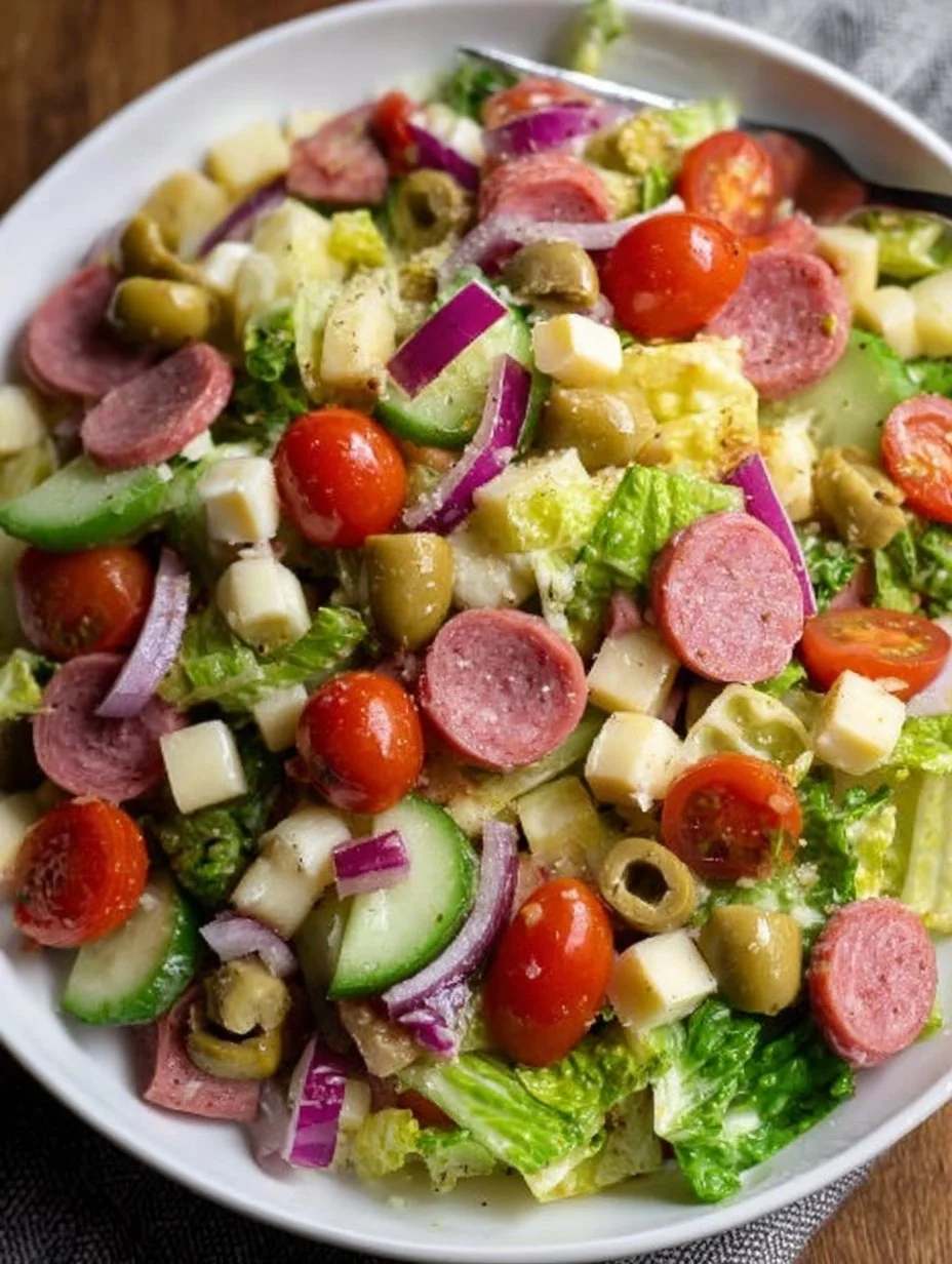 A vibrant Italian Chopped Salad with fresh vegetables and herbs
