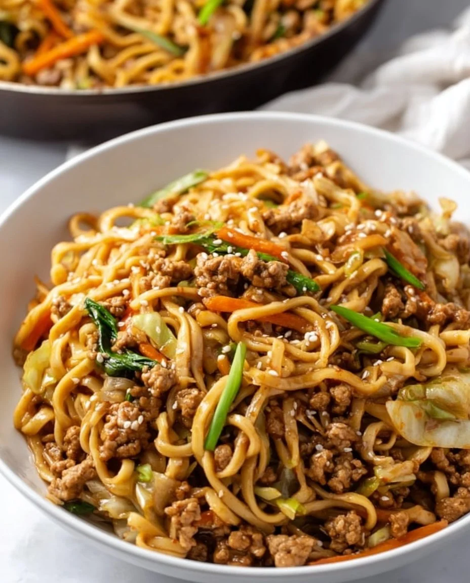Bowl of quick and easy pork noodles with vegetables and sauce