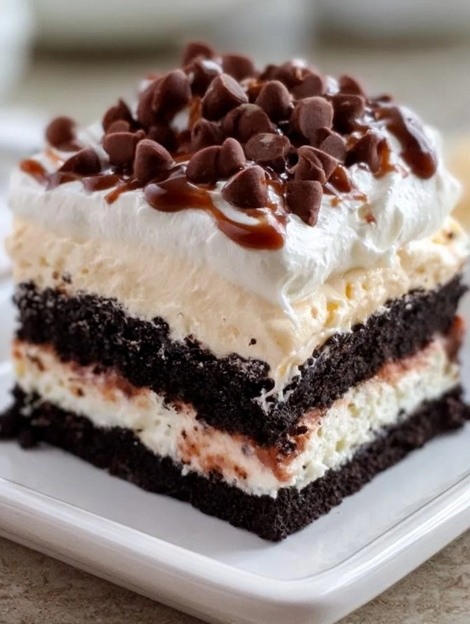 Delicious no bake chocolate lasagna dessert with layers of chocolate and cream.
