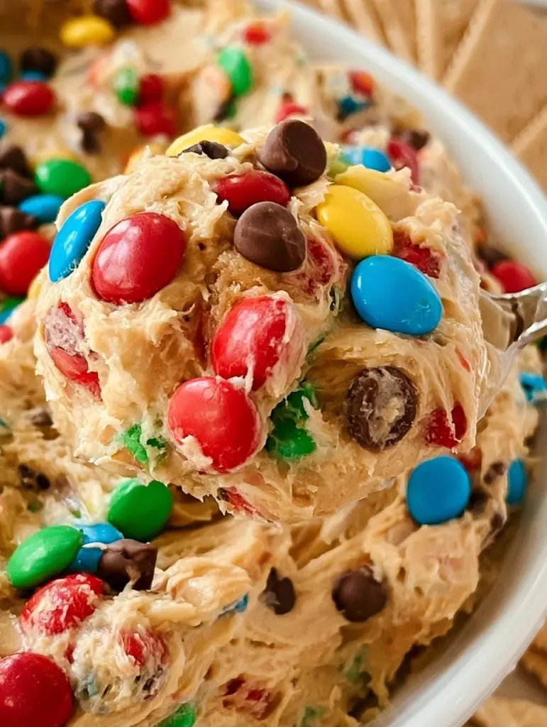 Delicious Monster Cookie Dough Dip served in a bowl with sprinkles
